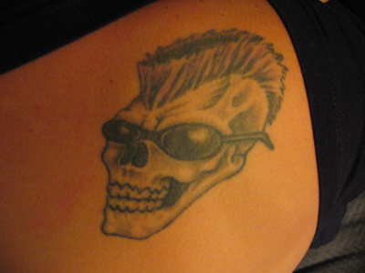 Funky Skull Hairstyle Tattoo