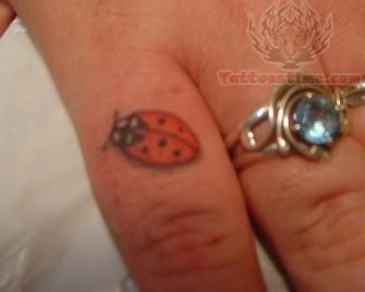Ladybug Tattoo On Finger