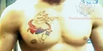 Jain Tattoo on Man Chest