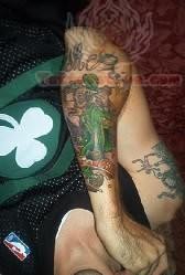 Leprechaun Tattoo On Elbow