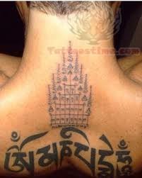 Thai Tattoo On Upper Back