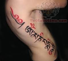 Tibetan Tattoo On Side Rib