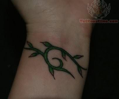 Green Leave Tattoo On Wrist