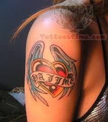 Winged Sacred Heart Tattoo On Bicep