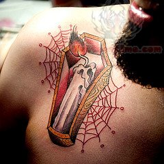 Coffin Tattoo On Chest