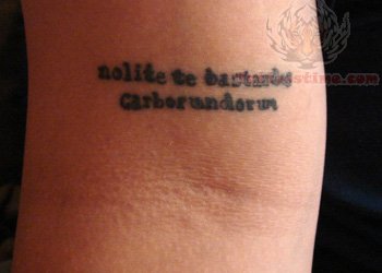 Literary Tattoo On Elbow