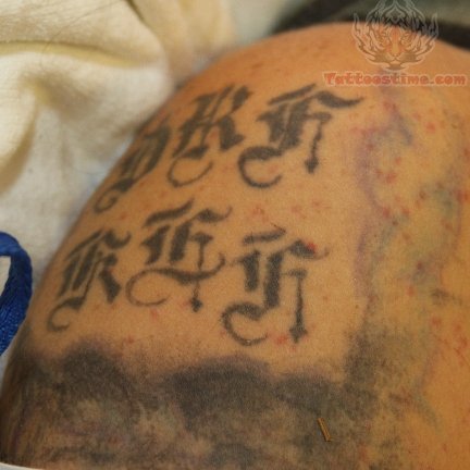 Symbol Words Tattoo On Shoulder