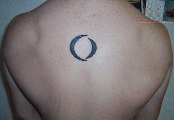 Small Circle Tattoo On Back