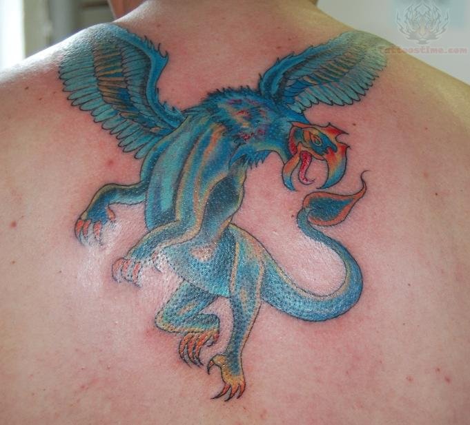Griffin Tattoo On Upper Back