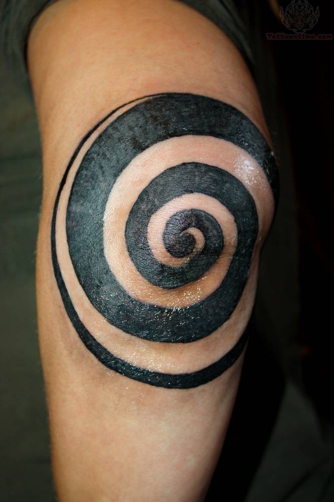 Large Spiral Tattoo On Elbow