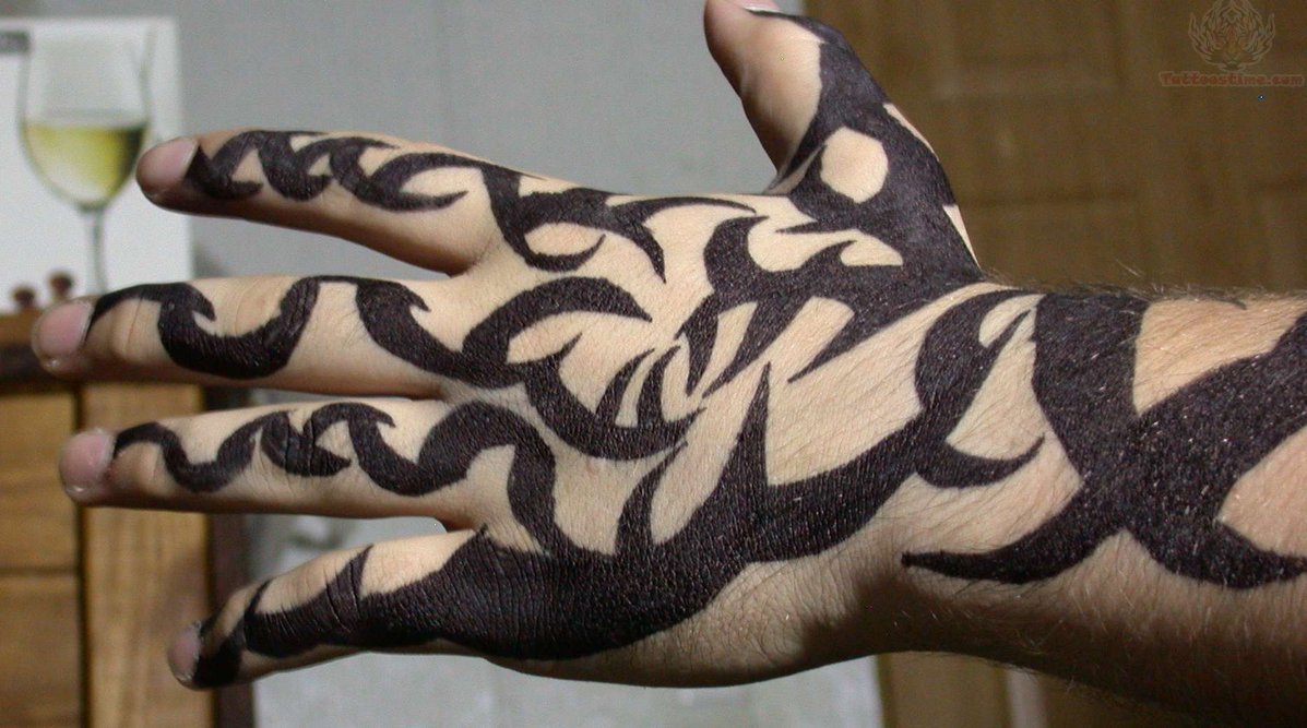 Tribal Marking Tattoo On Thumb