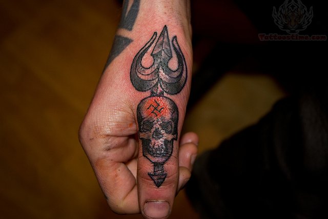 Trishul And Skull Tattoo On Thumb