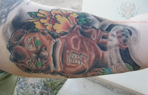 Color Foo Dog Tattoo On Muscles