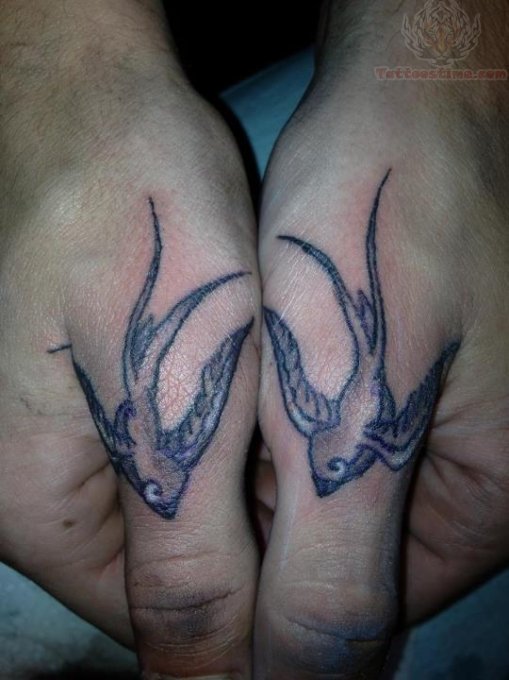 Swallows Thumbs Tattoos
