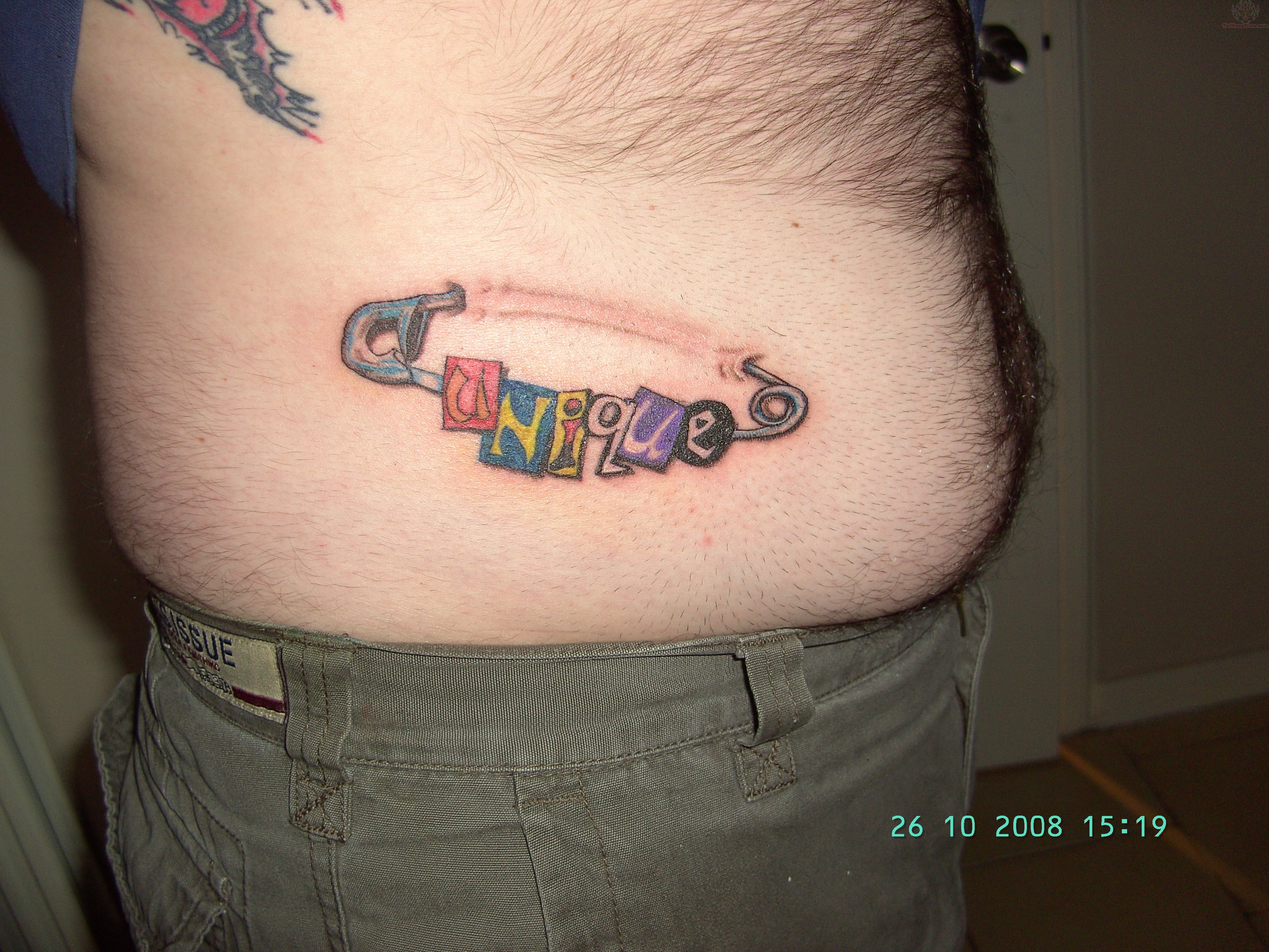 Unique Safety Pin Tattoo On Side Rib