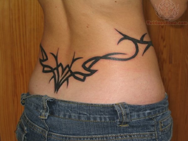 Tribal Design On Girl Tail Bone