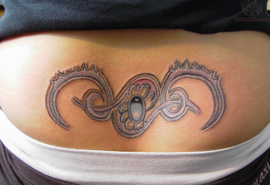 Tribal Flower Tailbone Tattoo