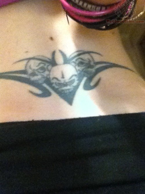 Tribal Skull Tail Bone Tattoo