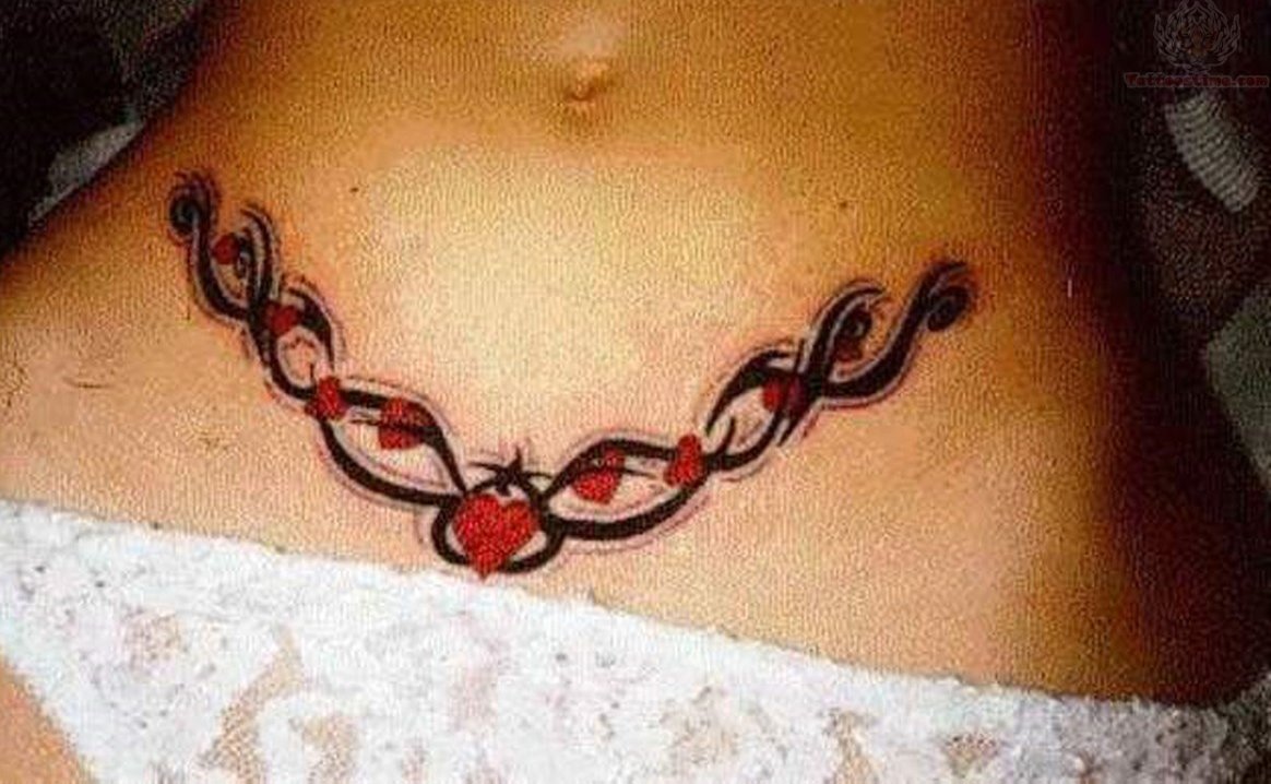 Red Hearts And Tribal Tattoo On Belly