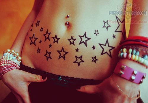 Stars Tattoos And Belly Button Piercing