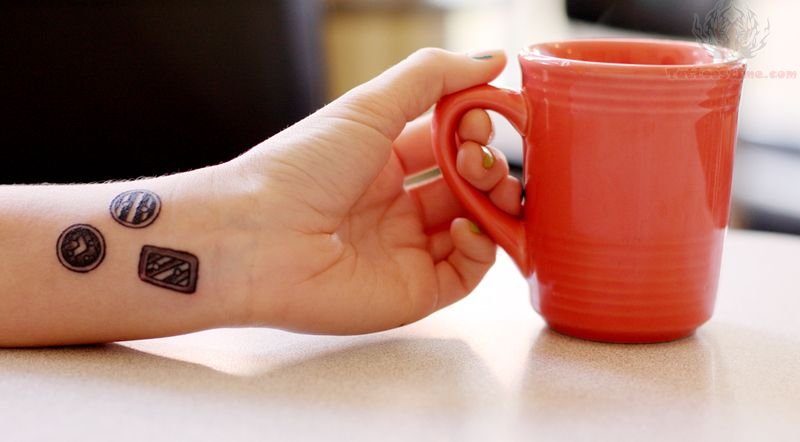 Stylish Button Tattoos On Girl Wrist