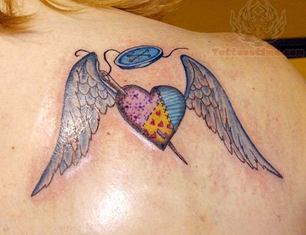 Winged Heart And Button Tattoo On Back Shoulder