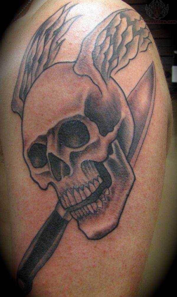 Winged Skull And Knife Tattoo