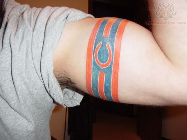 Guy With Chicago Bears Tattoo On Muscles