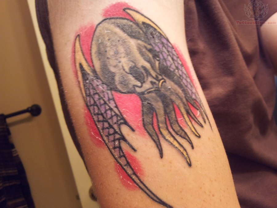 Winged Cthulhu Tattoo On Biceps