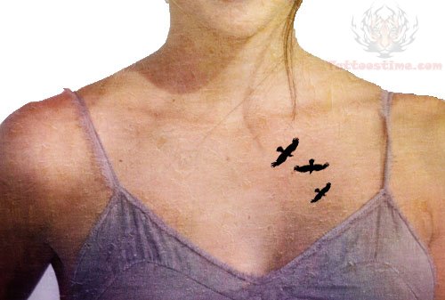 Tiny Ravens Flying Tattoo On Girl Chest