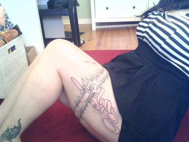 Sewing Thigh Band Tattoo
