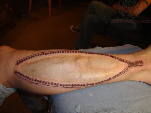 Zipper Tattoo On Right Leg