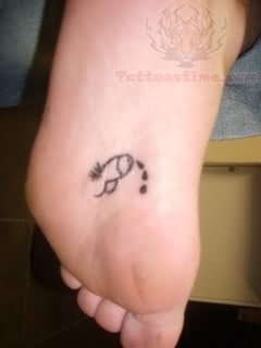 Spects Tattoo On Bottom Of Foot