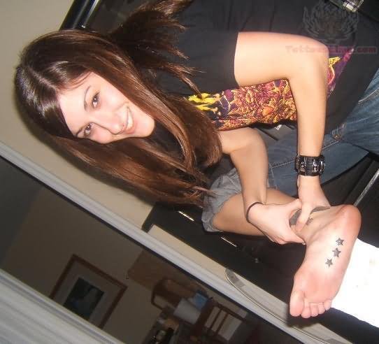 Stars Tattoos Under Girl Foot