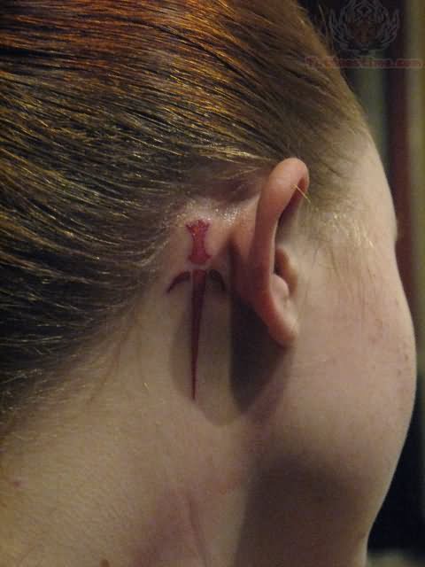 Taarna Dagger Tattoo Behind Ear