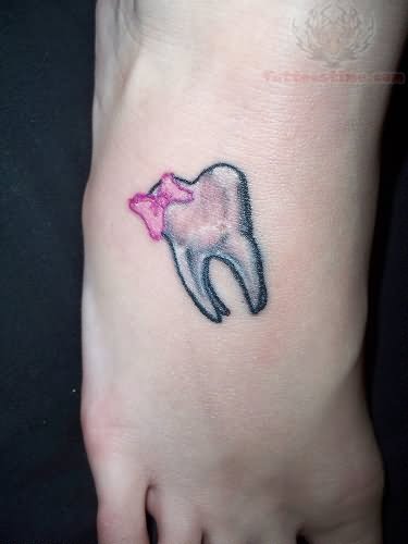 Pink Bow Molar Tattoo On Foot