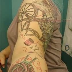 Yarn and Spool Tattoo On Left Sleeve