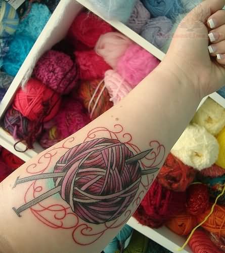 Yarn Tattoo On Left Forearm