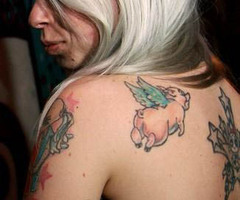 Winged Flying Pig Tattoo On Back Shoulder