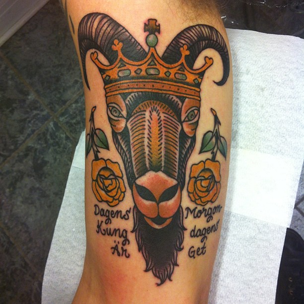 Yellow Rose And Goat Head Tattoo On Half Sleeve