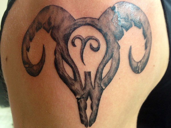 Grey Ink Aries Head Tattoo On Shoulder