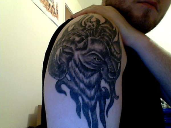 Grey Ink Aries Tattoo On Man Right SHoulder