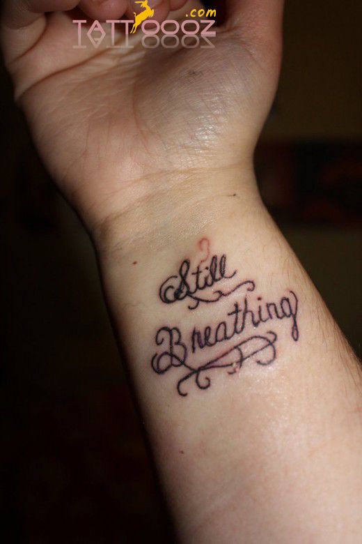 Still Breathing Feminine Tattoo On Wrist