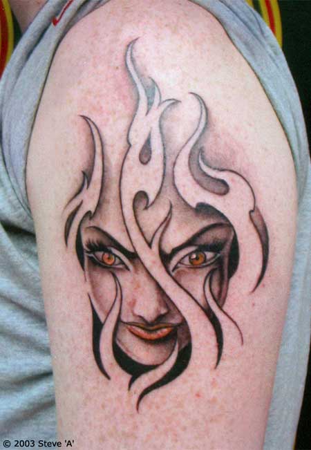 Grey Ink Girl Head In Flames Tattoo On Left Shoulder