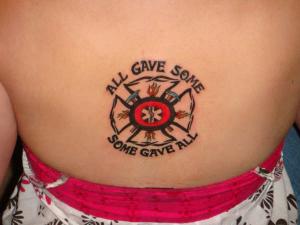 Small Firehighter Tattoo On Back
