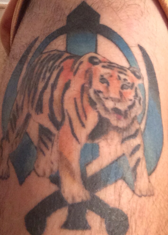 Colored Tiger And Blue Sikh Khanda Tattoo