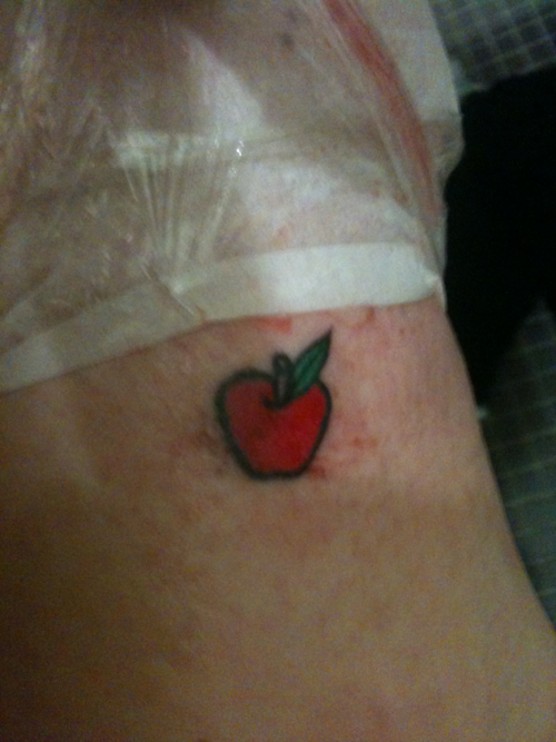 Tiny Red Apple Tattoo