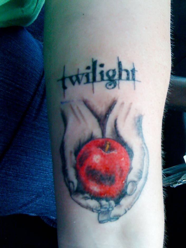 Twilight Apple Tattoo On Bicep