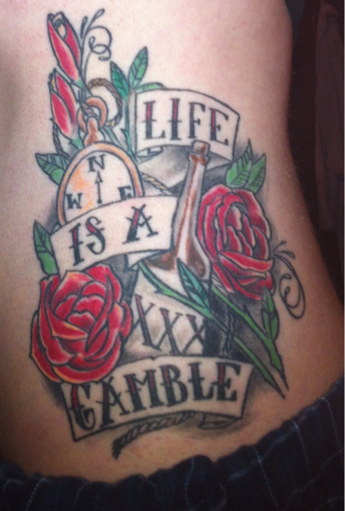 Red Rose Flowers And Gamble Tattoo On Side Rib