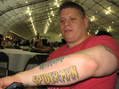 Spiderman Geek Tattoo On Left Arm